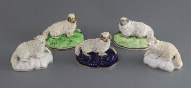 Five Samuel Alcock porcelain figures of recumbent sheep, c.1835-50, impressed '8' and '9', L. 9.