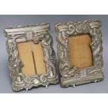 A pair of Japanese antimony 'dragon' photograph easel frames height 24cm