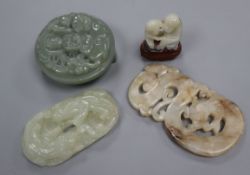 Two Chinese jade plaques and a belt buckle and a monkey group