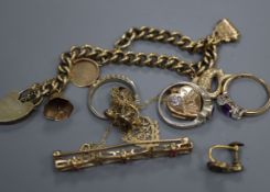 A silver gilt charm bracelet with four 9ct gold charms and other jewellery including 9ct pendants