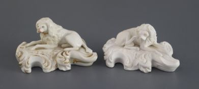 Two Derby porcelain figures of recumbent poodles, c.1825-45 glazed example with red crowned 'D'