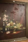 M. Berthelon, oil on canvas, still life of Fruit and champagne bottles on a table top, signed, dated
