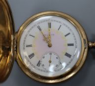 An early 20th century Elgin engine turned gold plated hunter keyless pocket watch, with a 9ct gold