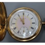 An early 20th century Elgin engine turned gold plated hunter keyless pocket watch, with a 9ct gold