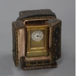 A miniature carriage timepiece, leather cased