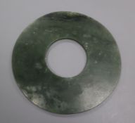 A Chinese spinach green jade bi disc 15.4cm