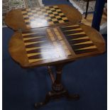 A Victorian walnut and boxwood line inlaid work / games table, the top opening to reveal a surface