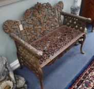 A Victorian style cast iron garden bench W.111cm