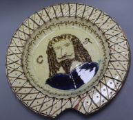 A 19th century slipware portrait dish diameter 42cm - a.f.