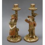 A pair of Royal Worcester Hadley candlesticks height 25.5cm