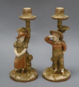 A pair of Royal Worcester Hadley candlesticks height 25.5cm