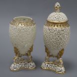 A pair of Grainger Worcester reticulated vases (one with cover) H.20cm