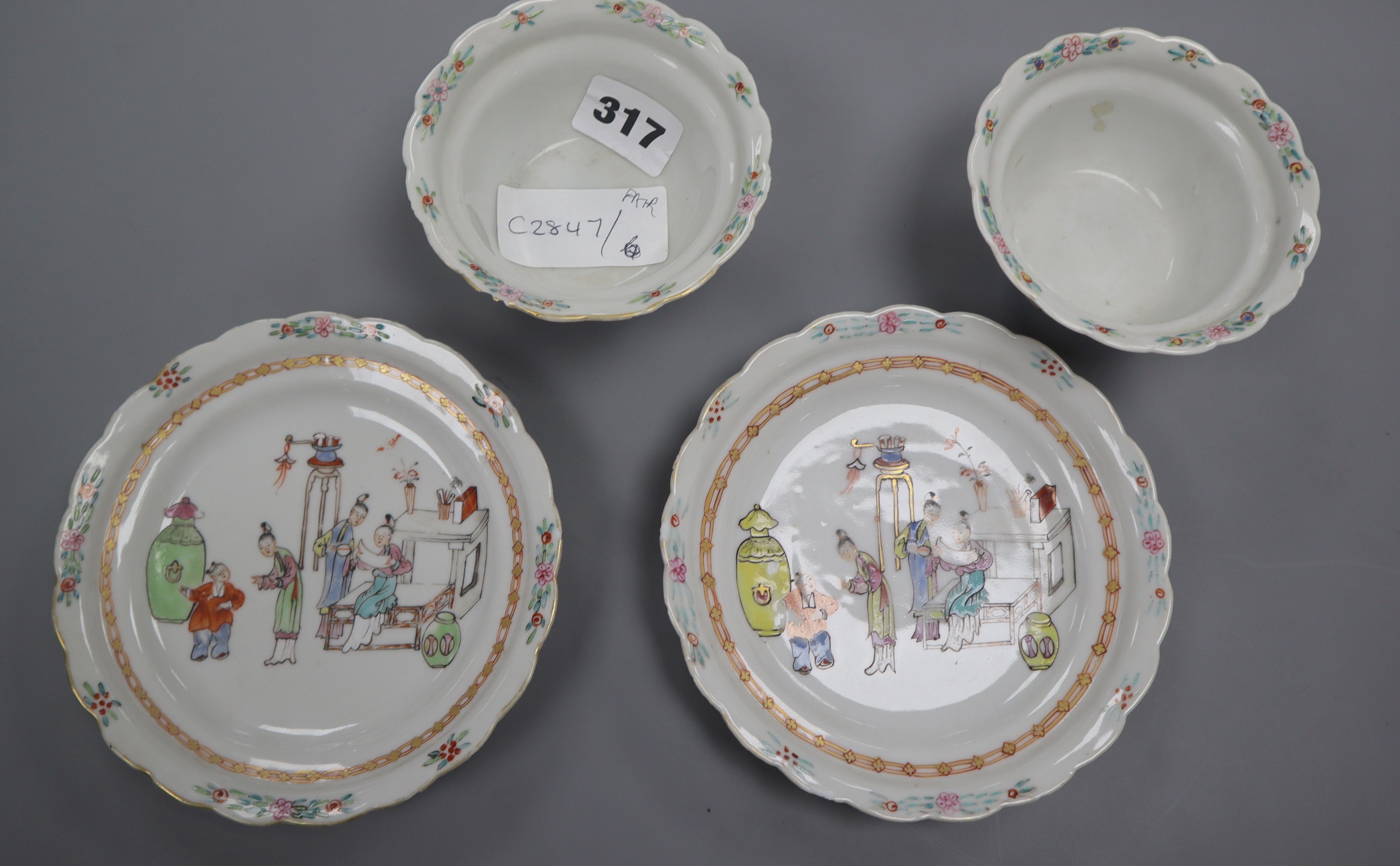 A pair of late 18th century Chinese cups and saucers