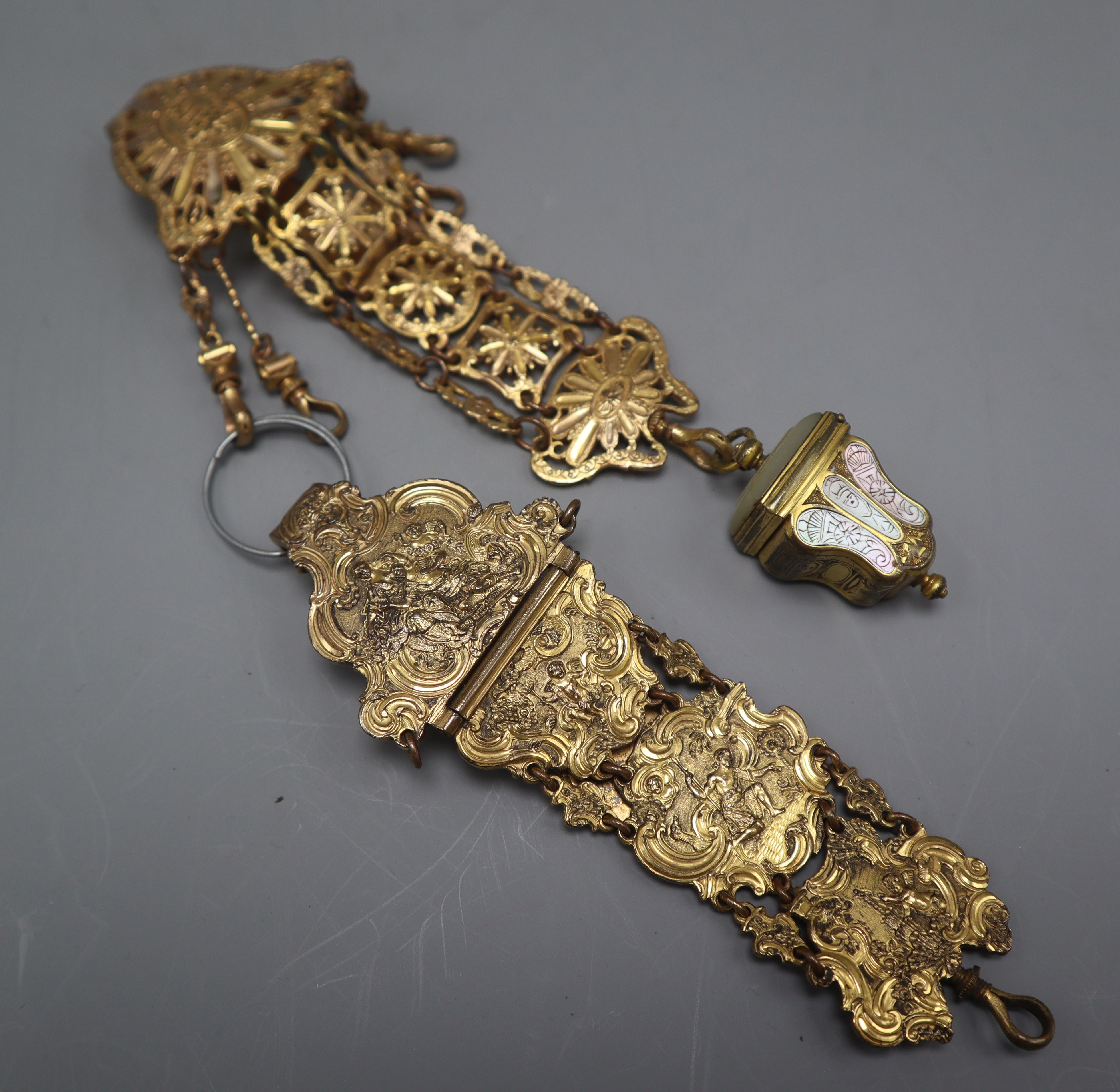 An 18th century Continental gilt metal chatelaine, with mother of pearl inlaid thimble case and