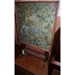 A tapestry panel / occasional table of an equestrian in woodland W.47cm