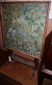 A tapestry panel / occasional table of an equestrian in woodland W.47cm