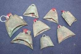 Eight Chinese bronze models of temple bells, Warring States period or Han dynasty