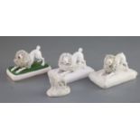 Four Chamberlains Worcester porcelain figures of poodles, c.1820-40, three crouching on a cushion (