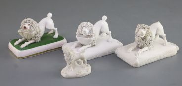 Four Chamberlains Worcester porcelain figures of poodles, c.1820-40, three crouching on a cushion (