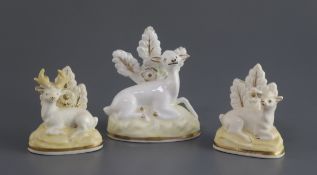 A Samuel Alcock porcelain figure of a deer and a similar pair of figures, c.1835-50, each