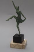An Art Nouveau style patinated bronze of a female dancer, on marble base height 21cm