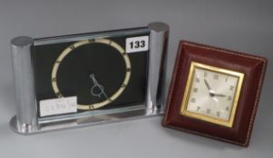 An Art Deco-style chrome desk timepiece and an alarm clock