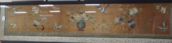 A 19th century Chinese embroidered silk panel 42 x 197cm excluding frame