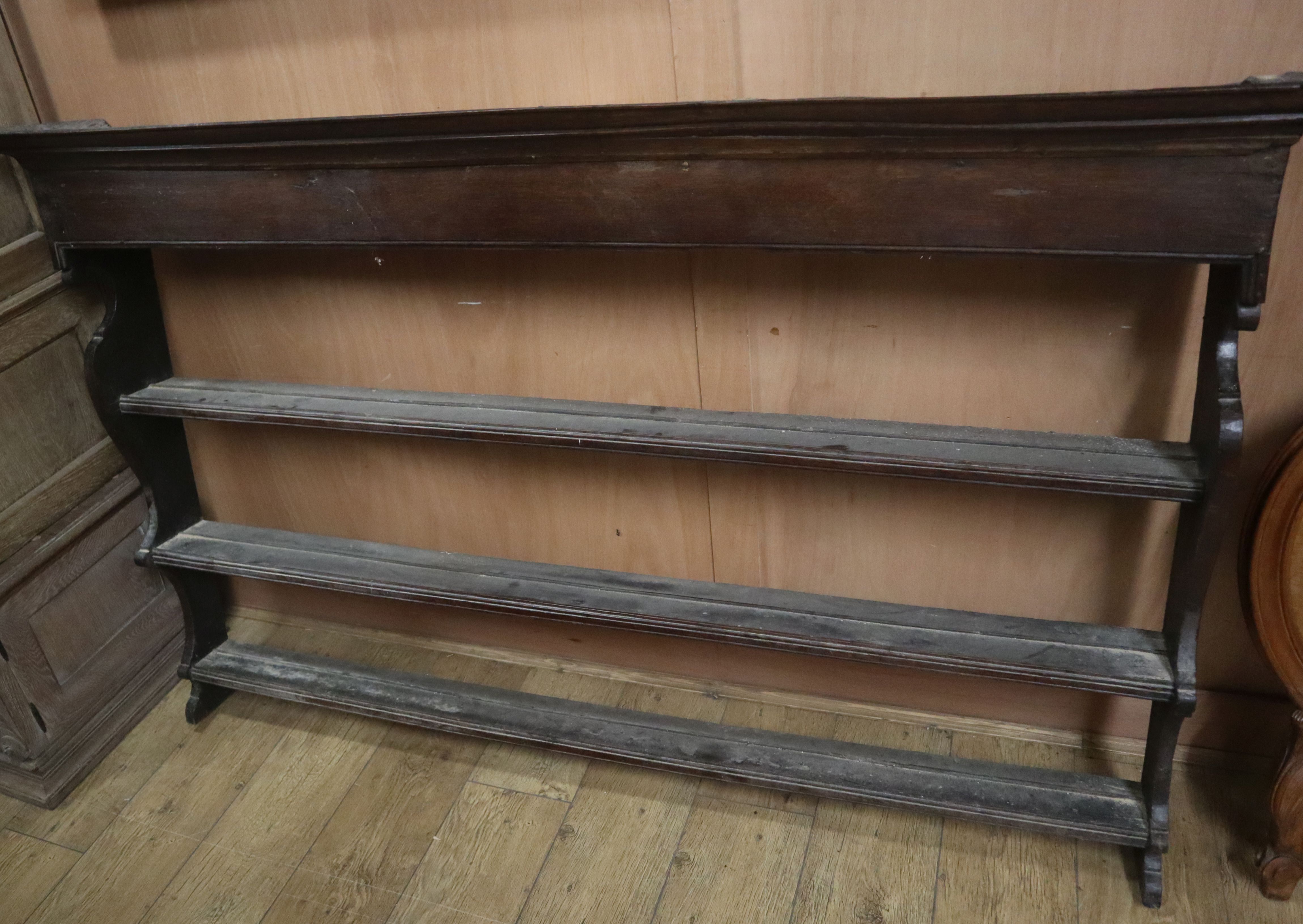 An 18th century oak plate rack W.175cm