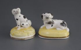 Two small Samuel Alcock porcelain figures of King Charles spaniels, c.1835-50, impressed '135'