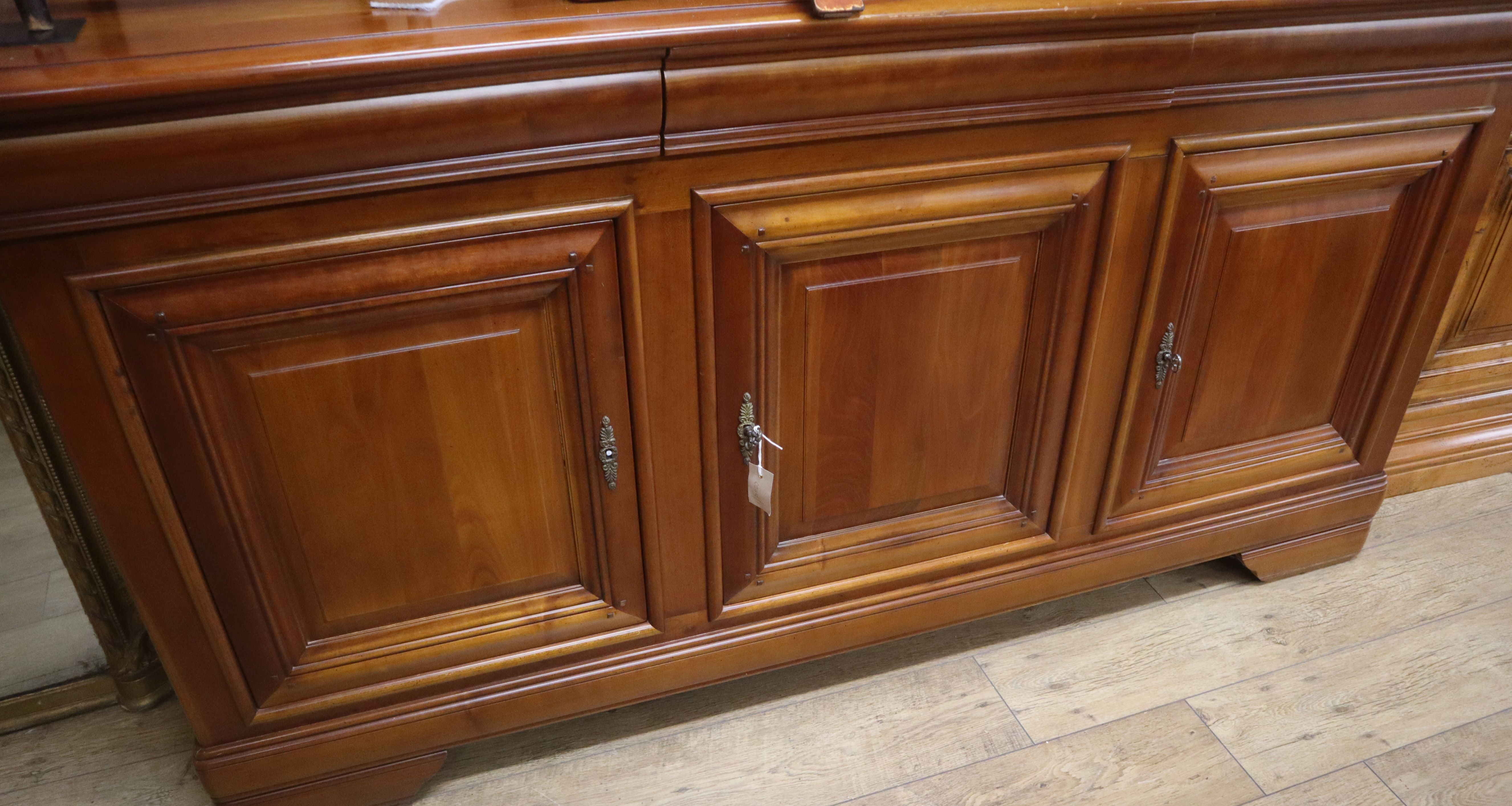 A reproduction French provincial style cherry sideboard W.196cm