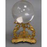 A crystal ball with ormolu stand height 16cm