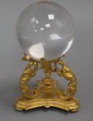 A crystal ball with ormolu stand height 16cm