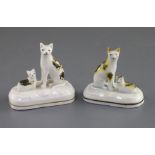 Two Staffordshire porcelain groups of a cat and kitten, c.1835-50, each with tortoiseshell markings,