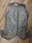 An 18th century gentleman's silver brocade and gold thread embroidered waistcoat