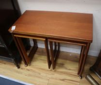 A mid-century MacIntosh teak folding top nest of tables W.76cm