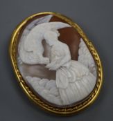 A gilt metal mounted oval cameo pendant brooch, carved with Diana & the Eagle, 65mm.