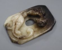 A Chinese black and white jade 'chilong' plaque, probably Ming dynasty 6cm