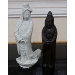 A Chinese blanc de chine figure of Guanyin and a bronze figure of Guanyin tallest 30.5cm