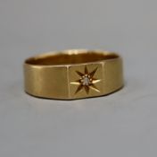 A gentleman's 18ct gold and gypsy-set diamond wedding ring, size R/S, gross 5 grams.