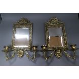 A pair of brass girandoles height 34cm