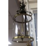 A gilt metal circular hall lantern