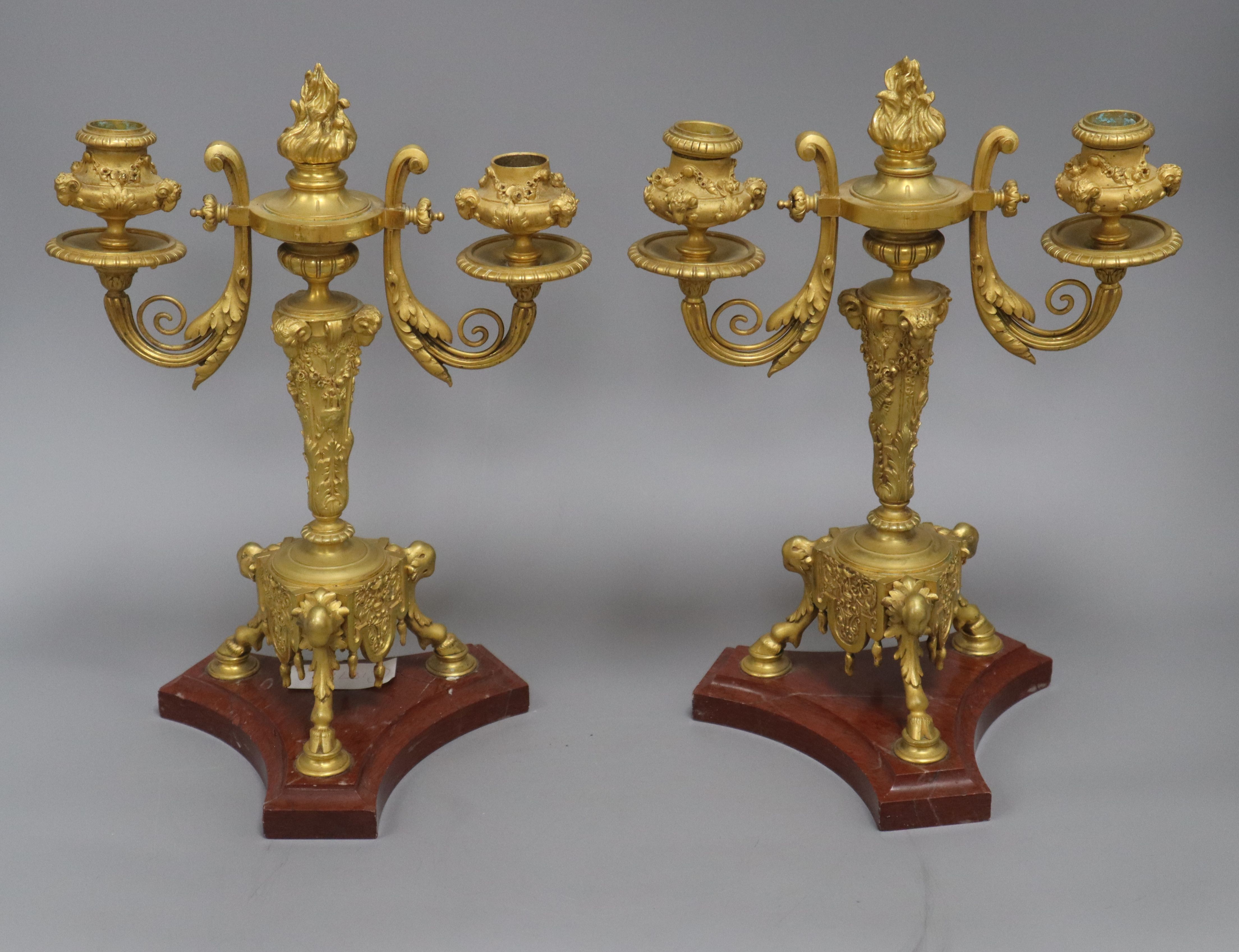 A pair of 19th century French ormolu and rouge marble two branch candelabra height 32cm