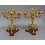 A pair of 19th century French ormolu and rouge marble two branch candelabra height 32cm