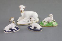 Four Chamberlain Worcester porcelain figures of recumbent deer and a sheep, c.1820-40, comprising