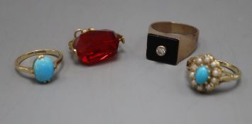 Three assorted gem set rings including 9ct and diamond and a 9ct gold mounted seal.
