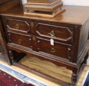 A pair of 1920's 17th century design oak two drawer geometric moulded chests on stands W.106cm