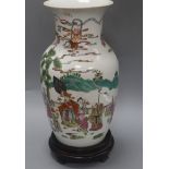 A Chinese famille rose porcelain vase, on hardwood stand overall 42cm