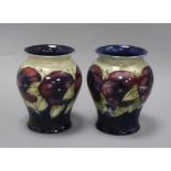 A pair of Moorcroft Pansy vases height 17cm