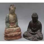 A patinated spelter figure of Buddha and a painted wood figure of Buddha tallest 31cm
