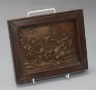 A bronze putti plaque overall 16 x 20cm